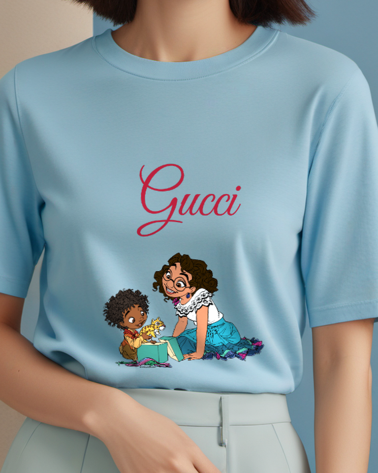 Sky Blue Mirabel And Child Playing With Toy Graphic T-Shirt - model wearing view