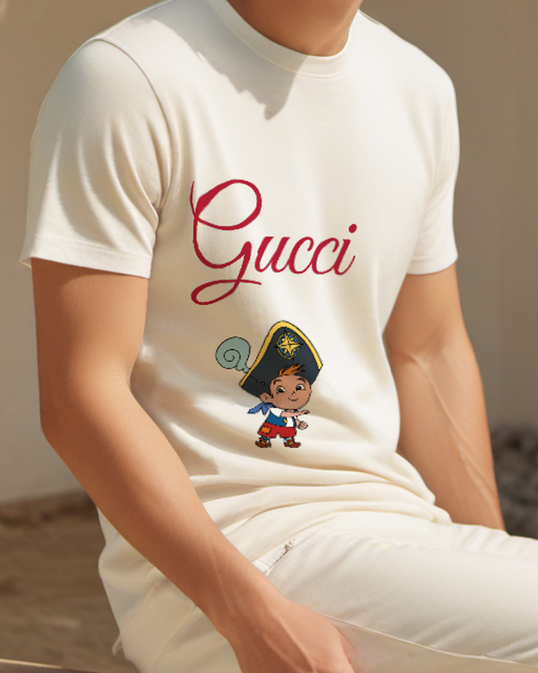 Ivory Cubby In Pirate Hat Smiling Arms Crossed Graphic T-Shirt - model wearing view