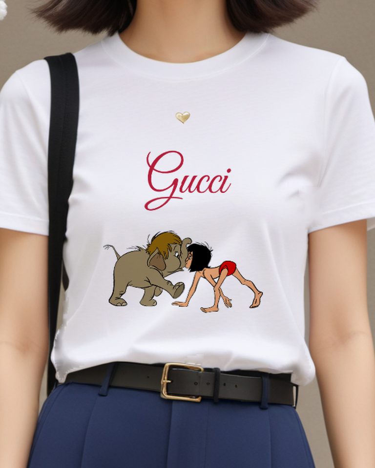 White Young Boy And Elephant In Playful Stance Graphic T-Shirt - model wearing view