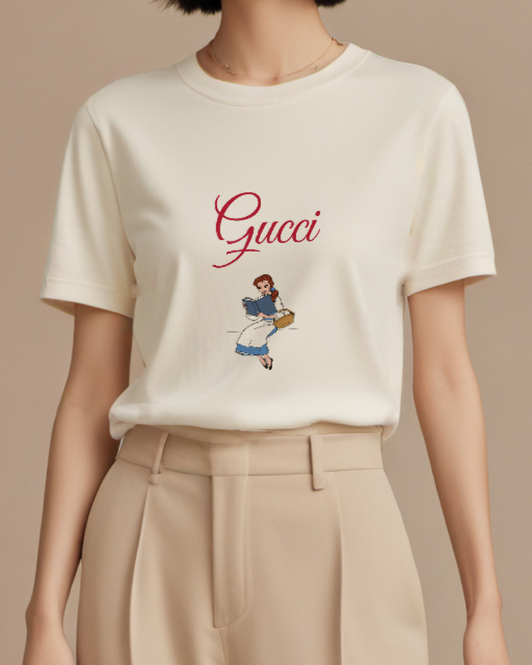 Ivory Belle Reading Book While Seated Crew Neck Graphic T-Shirt - model wearing view