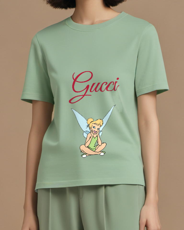 Sage Green Tinker Bell Sitting Cross Legged Smiling Graphic T-Shirt - model wearing view